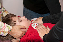 A child receives sensory massage