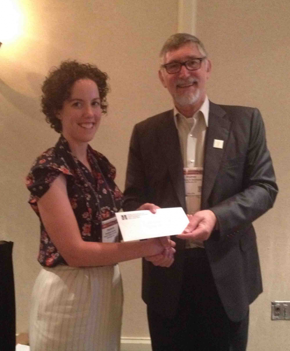 Stephanie Hoover receiving award from President Rodney Goodyear, Ph.D. Department of Educational Psychology